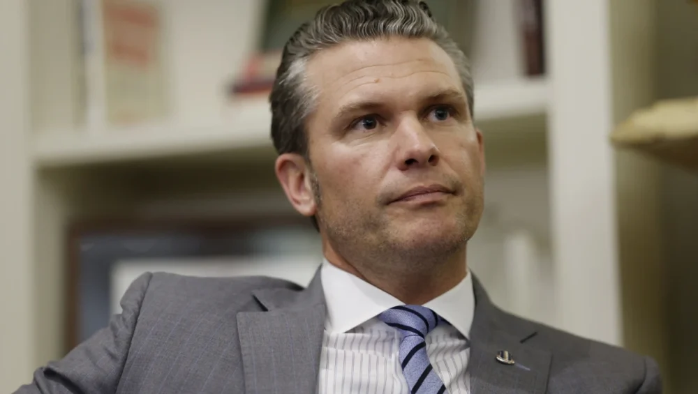CODEPINK Activist Arrest Defying War Criminal Pete Hegseth
